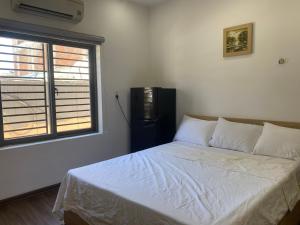 Postelja oz. postelje v sobi nastanitve Tree Homestay