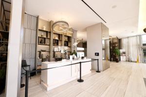 a store with a counter in the middle of a room at Zen Beach House Luxury 1-Bedroom Intracoastal Views in Hollywood