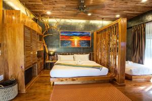 Postel nebo postele na pokoji v ubytování Andalay Beach Resort Koh Libong