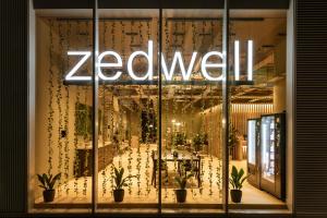 a store window with a zelwell sign on it at Zedwell Hotel Greenwich in London