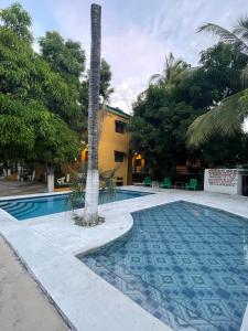 Bazén v ubytování Hotel Posada Playa Manzanillo nebo v jeho okolí