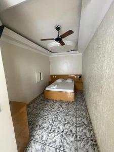 Giường trong phòng chung tại Hotel Kiss Sapopemba