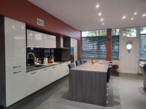 Kuchyňa alebo kuchynka v ubytovaní Agréable maison de ville, proche du centre ville