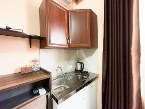 Kuchyň nebo kuchyňský kout v ubytování Apartment Centar + 20 fotografií