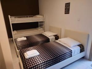 Posteľ alebo postele v izbe v ubytovaní Galotel Agnoudas near the airport