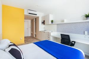 Postel nebo postele na pokoji v ubytování Soto House Pamplona + 25 fotografií