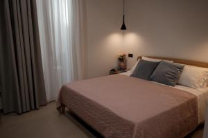 Posteľ alebo postele v izbe v ubytovaní Incanto B&B Cefalù