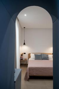 Posteľ alebo postele v izbe v ubytovaní Incanto B&B Cefalù