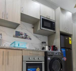 Η κουζίνα ή μικρή κουζίνα στο Cozy studio