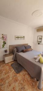 Posteľ alebo postele v izbe v ubytovaní Villa Don Giovanni Fuengirola, Piscina Privada y vistas al mar y a la Montaña