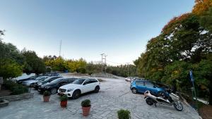 a group of cars parked in a parking lot at Philoxenia in Kavála