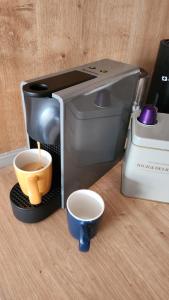 Marelis condo with sea viewにあるコーヒーまたはお茶