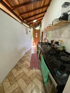 Kuchyň nebo kuchyňský kout v ubytování Casa alto do pontal