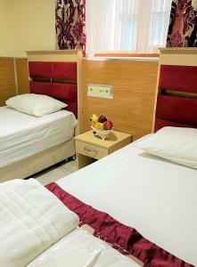 Cama o camas de una habitación en Viva Hotel Laleli