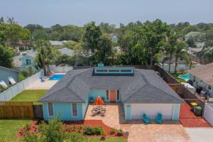 an aerial view of a house with a pool at Saltwater Oasis - Large Pool in Jacksonville Beach