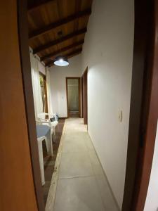 Postel nebo postele na pokoji v ubytování Casa alto do pontal
