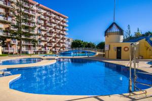 Bazén v ubytovaní 237 Estudio en Minerva Apartamentos - Piscina y Playa- Excelente Ubicación alebo v jeho blízkosti
