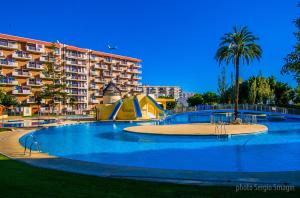 Bazén v ubytovaní 237 Estudio en Minerva Apartamentos - Piscina y Playa- Excelente Ubicación alebo v jeho blízkosti