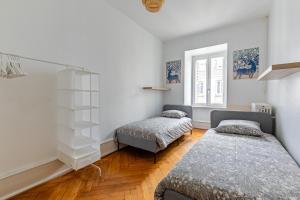 Ένα ή περισσότερα κρεβάτια σε δωμάτιο στο Strasbourg hyper centre - 120m2- F5