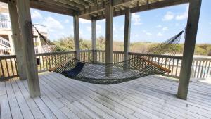 Un balcón o terraza de PI76, Life of Reilly- Oceanfront, Ocean Views, Private Pool, Private Beach Access, Foosball