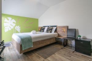 Postel nebo postele na pokoji v ubytování Leevin Guesthouse