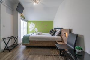 Postel nebo postele na pokoji v ubytování Leevin Guesthouse