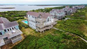 an aerial view of a large estate with houses at OCEANFRONT, Ocean Views, Priv Pool, Rec Room, 8 BRS, PM2, Old Glory in Sanderling