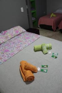 Lova arba lovos apgyvendinimo įstaigoje Hotel Caminito Iguazú Tango