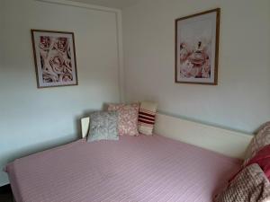 Giường trong phòng chung tại Apartmani Hanna