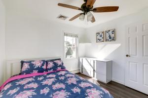 a bedroom with a bed and a ceiling fan at Edison Vacation Home 1 Mi to Train Station to NYC in Edison