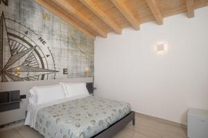 Postel nebo postele na pokoji v ubytování Theodore Rooms + 4 fotografie