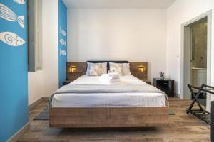 Postel nebo postele na pokoji v ubytování Leevin Guesthouse