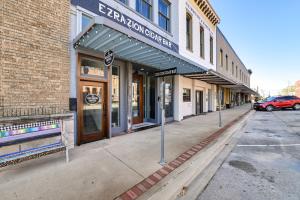 an empty street in a town with a building at Downtown Decatur Retreat Near Shopping and Dining! in Decatur