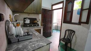 Кухня або міні-кухня у 15 شارع القاضي عياض الطابق 1 رقم 4