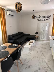 Posezení v ubytování Apartman sa jakuzijem
