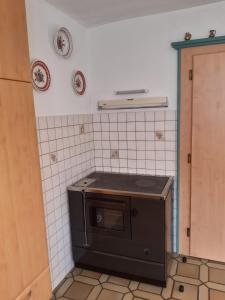 Kuchyň nebo kuchyňský kout v ubytování Ferienwohnung Haus Bergfrieden