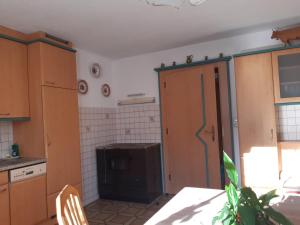 Kuchyň nebo kuchyňský kout v ubytování Ferienwohnung Haus Bergfrieden