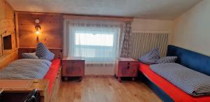 Postel nebo postele na pokoji v ubytování Pension Wassererhof