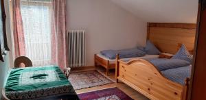Postel nebo postele na pokoji v ubytování Pension Wassererhof
