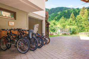 a row of bikes parked next to a building at Margarete Gwehenberger in Kleinarl
