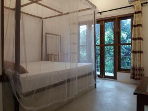 Säng eller sängar i ett rum på Villa Four Seasons