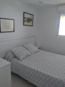 Postel nebo postele na pokoji v ubytování Atico Duplex 1ª
