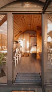 an asian room with a bedroom and a bed at Timber Valley Pods in Galston
