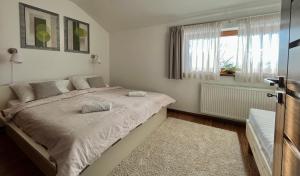 Postel nebo postele na pokoji v ubytování Apartmánový Dom 44