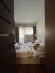 Posteľ alebo postele v izbe v ubytovaní Apartmánový Dom 44