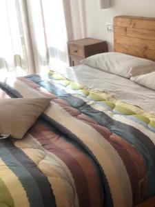 Postel nebo postele na pokoji v ubytování B&B Belli Dentro