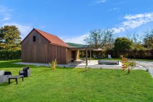 Κήπος έξω από το La Plaine aux Etoiles - Maison Individuelle avec Piscine Balnéo Privative et Jardin