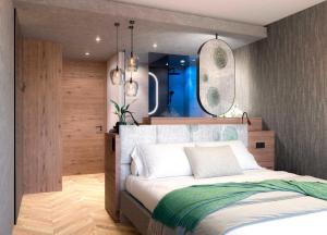 Voodi või voodid majutusasutuse Hotel Bergland toas