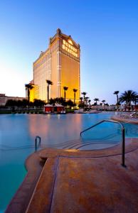 a large building with a pool in front of it at Sunset Station Hotel & Casino in Las Vegas