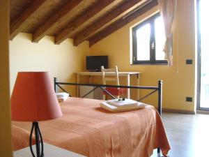 Ліжко або ліжка в номері Aurora dell'Etna